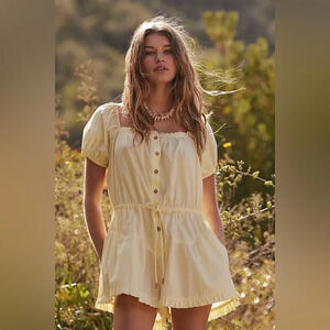 Free People A Sight For Sore Eyes Romper Square Neck Puff Sleeve in lemon color